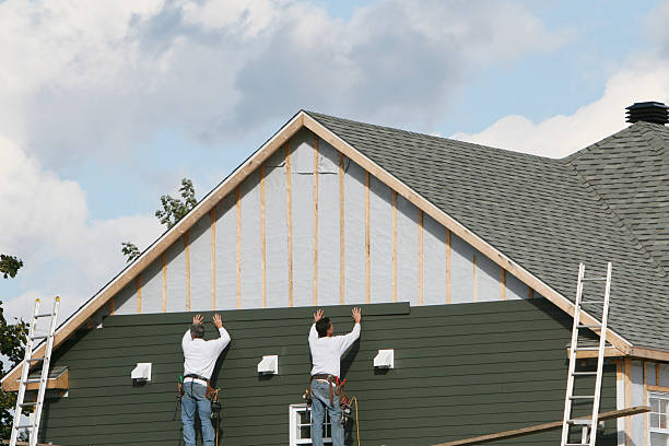 Professional Siding technician working in New Germany, MN